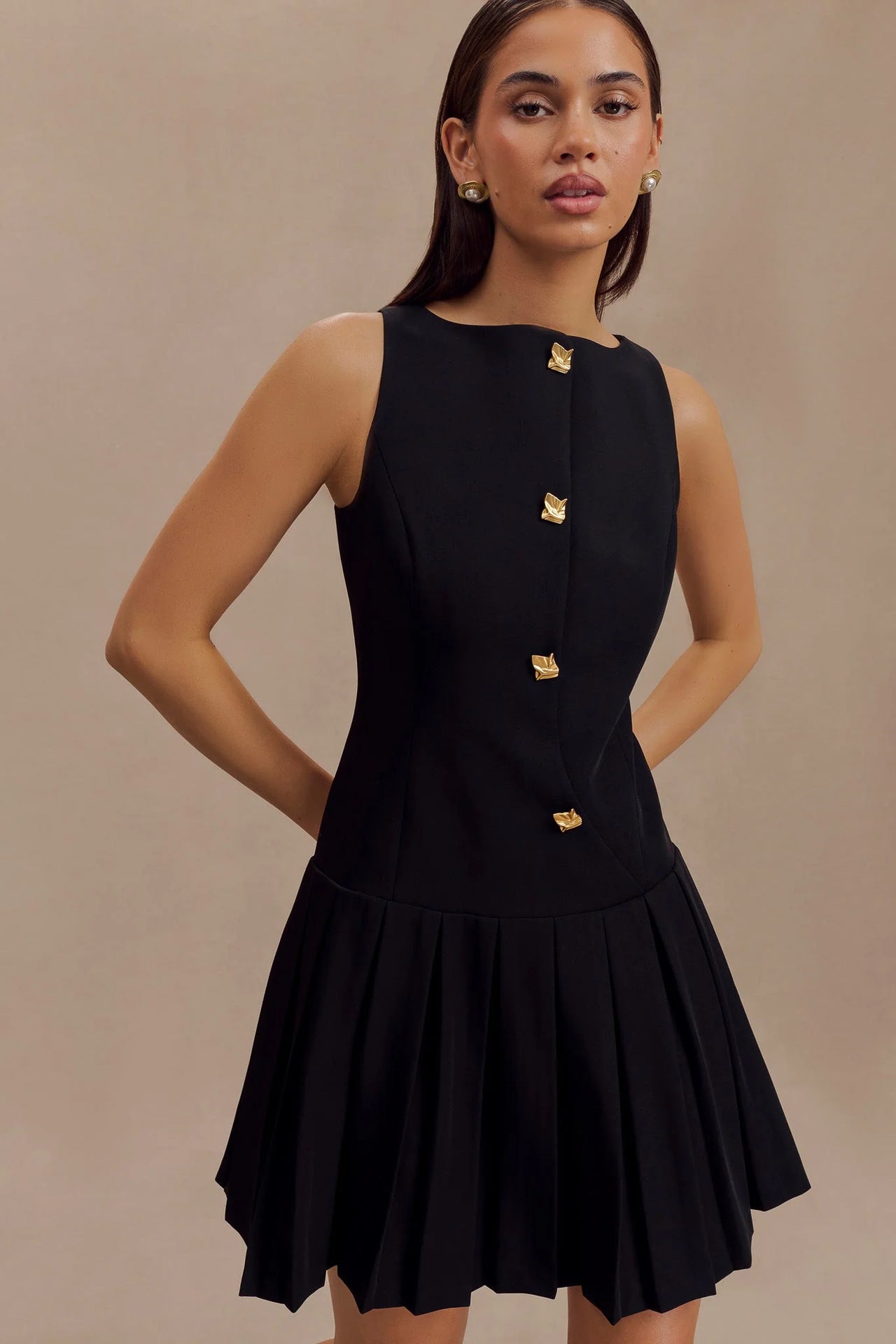 Amelia Grace Sleeveless Mini Dress with Pleated Detailing