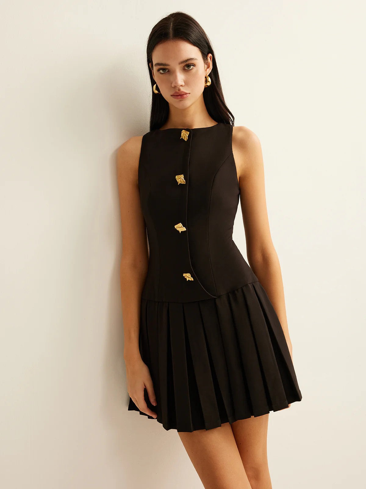 Amelia Grace Sleeveless Mini Dress with Pleated Detailing