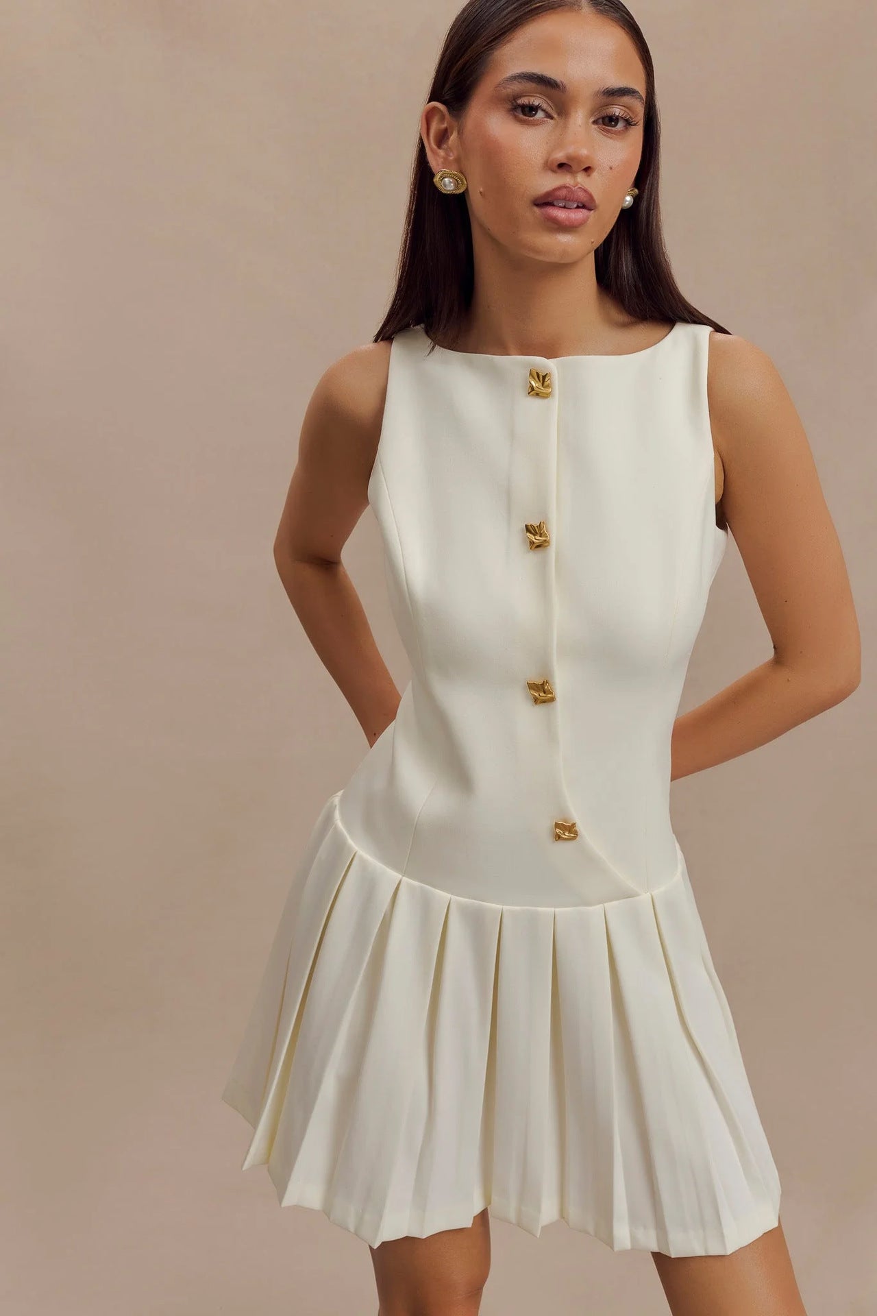 Amelia Grace Sleeveless Mini Dress with Pleated Detailing