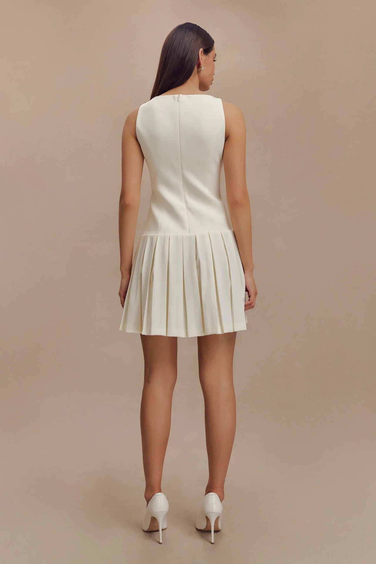 Amelia Grace Sleeveless Mini Dress with Pleated Detailing